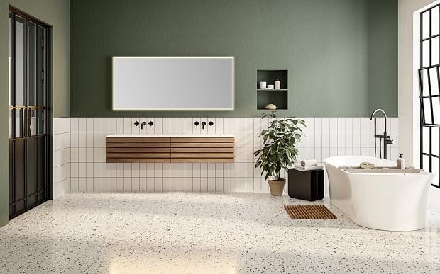 Moderne bad med servantmøbel, fliser og frittstående badekar i tidløs stil